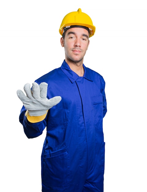 Confident workman on white background