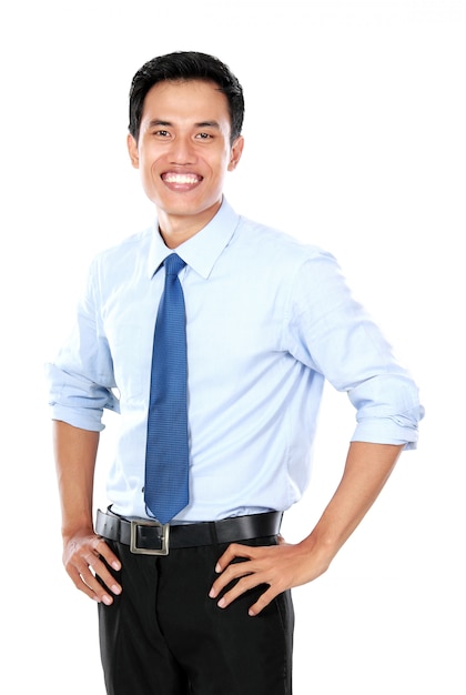 Confident young businessman looking at camera