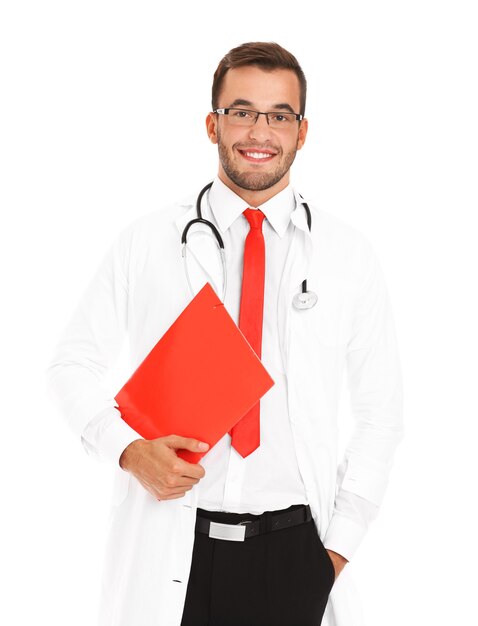 a confident young doctor holding a file over white background