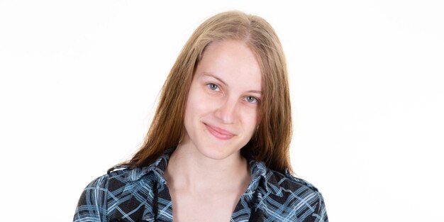 Confident young pretty woman in blue shirt on white isolated background