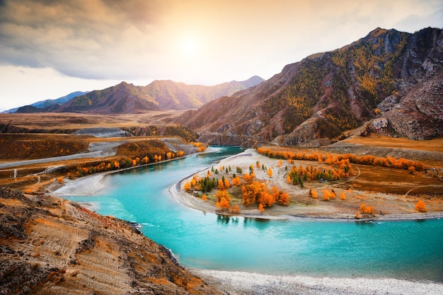 Confluence of Chuya and Katun rivers in Altai mountains, Siberia, Russia. Autumn landscape. Famous tourist destination