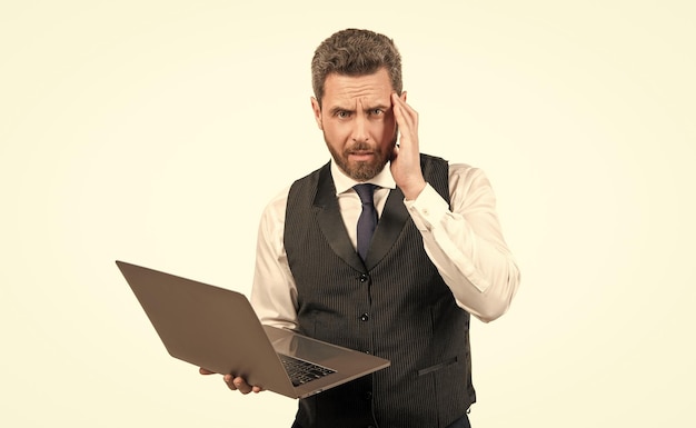 Confused businessman working on pc isolated on white background business