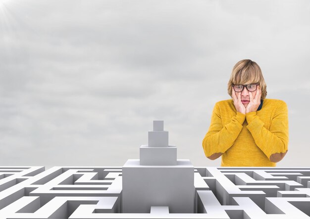 Photo confused man looking at a maze against a sky with clouds