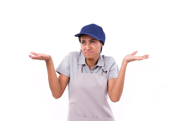 Confused, upset woman worker shrugging