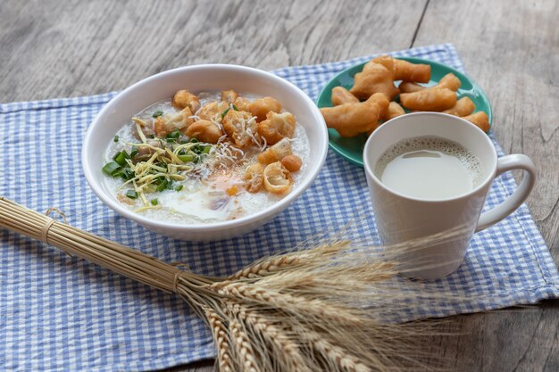  Congee  boiled egg with soy milk and Chinese deep fried double dough stick