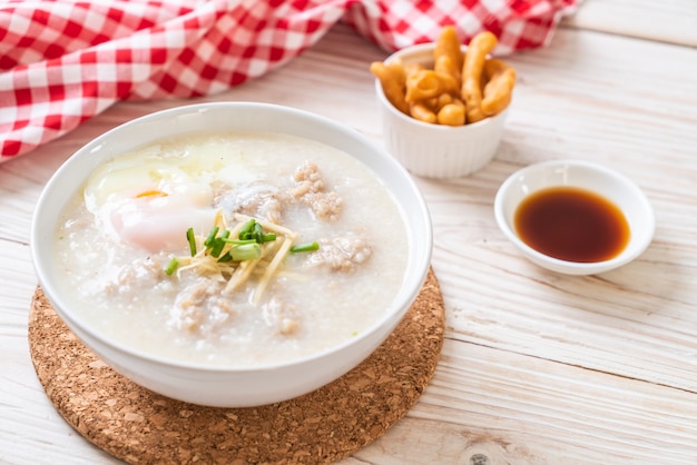 congee with minced pork in bowl 