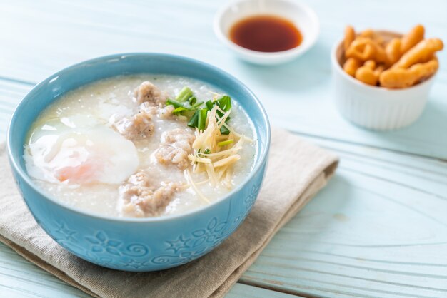 congee with minced pork in bowl 