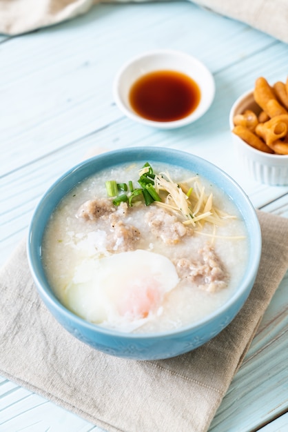 congee with minced pork in bowl 