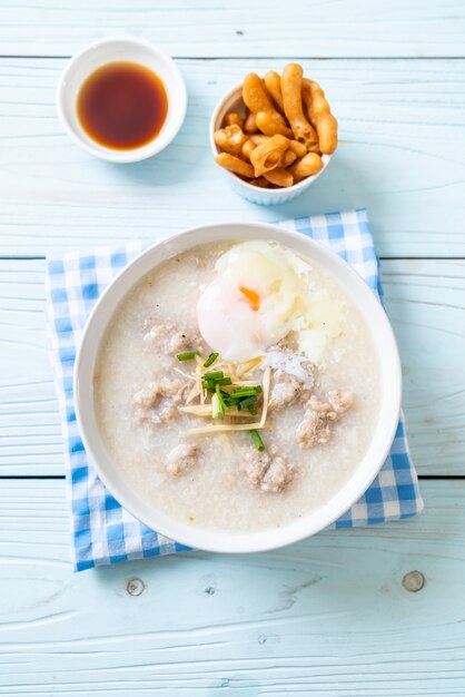 congee with minced pork in bowl 