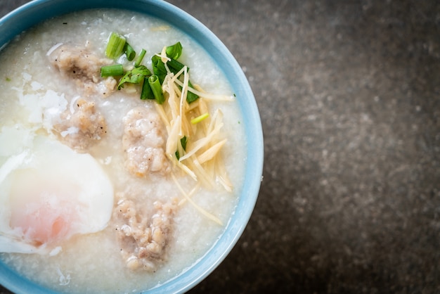 congee with minced pork in bowl 