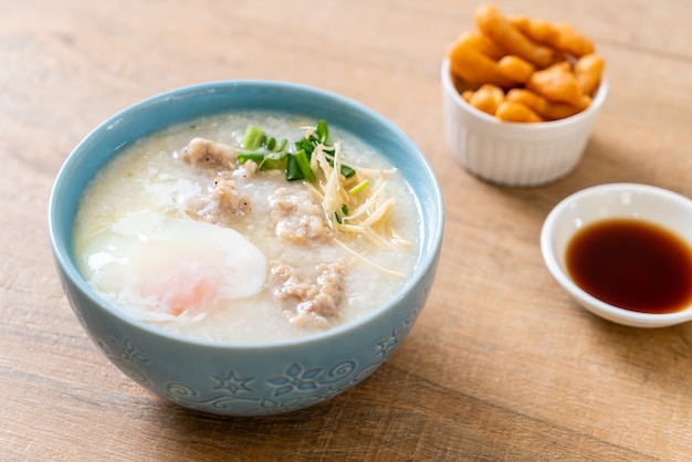 congee with minced pork in bowl 