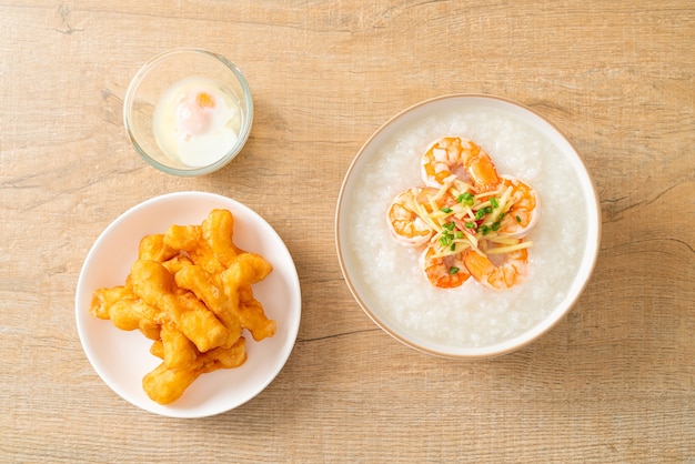 Congee with shrimps and fresh ginger on top