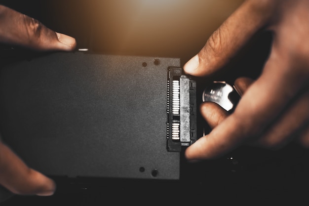 Connect the SSD hard drive to the laptop.