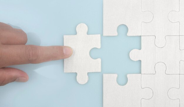 Connecting jigsaw puzzle . Business solutions success and strategy concept