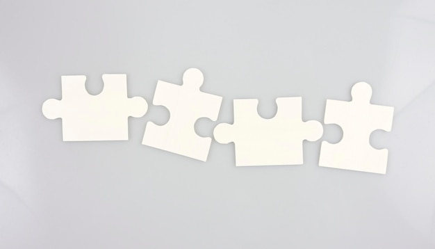 Connecting jigsaw puzzle in a hand. Business solutions success and strategy concept