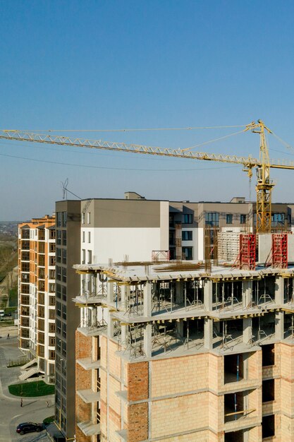 Construction and construction of high-rise buildings, the construction industry with working equipment and workers