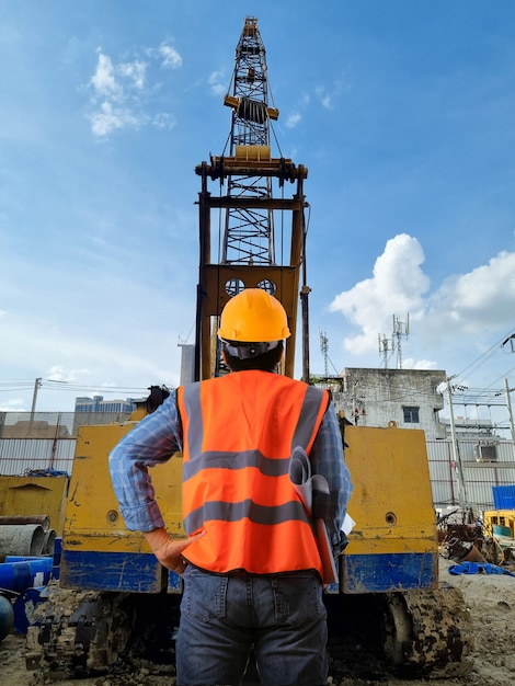 Construction control engineer Cranes on the construction site area industry machine of drilling piles