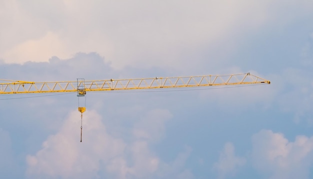 Construction crane over blue sky