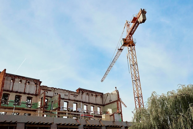 Construction crane and building at construction site