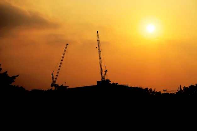 construction crane on day with twilight sky