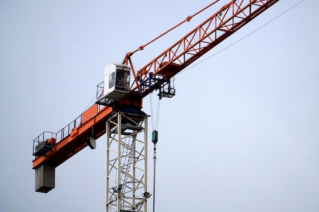 Construction crane and sky in background