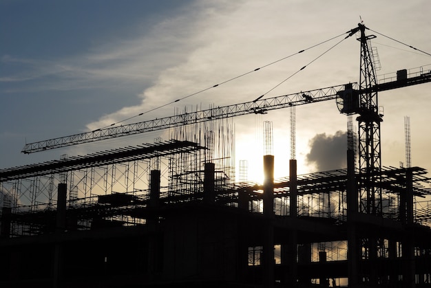 The construction crane on sunset 