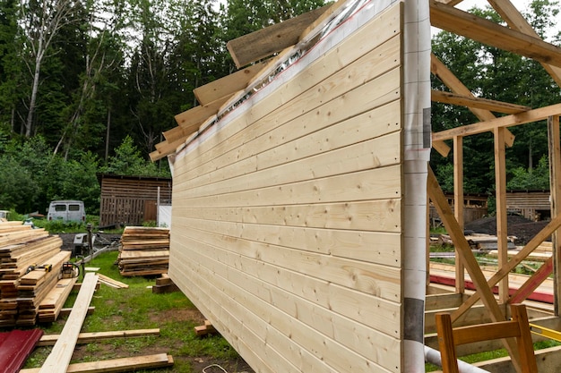 Construction of a frame house Timber frame house new build roof