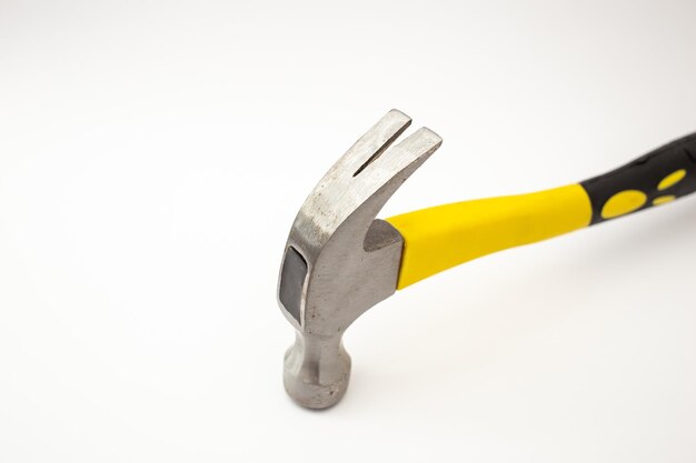 Construction hammer on white background