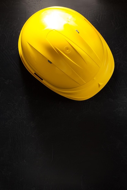 Construction helmet on black