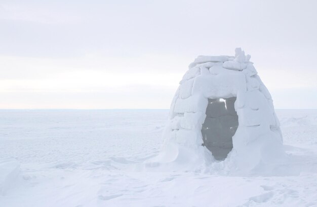 Construction of igloo from snow and ice