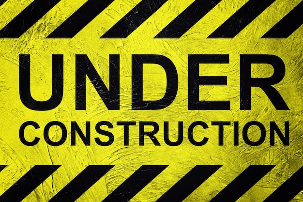 Photo under construction industrial sign. retro style.