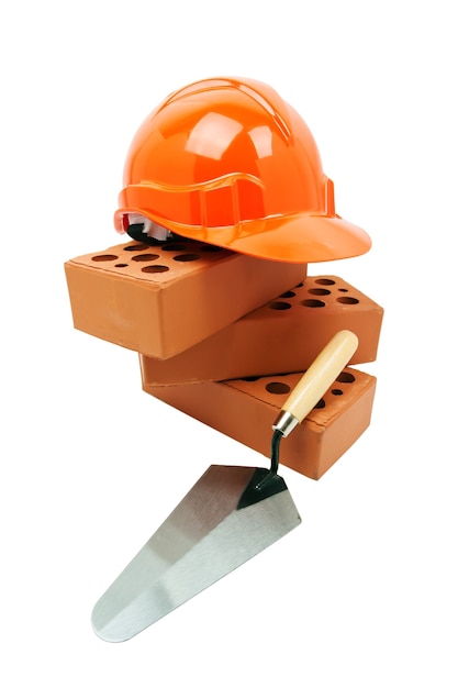Photo construction industry bricks trowel hardhat orktools