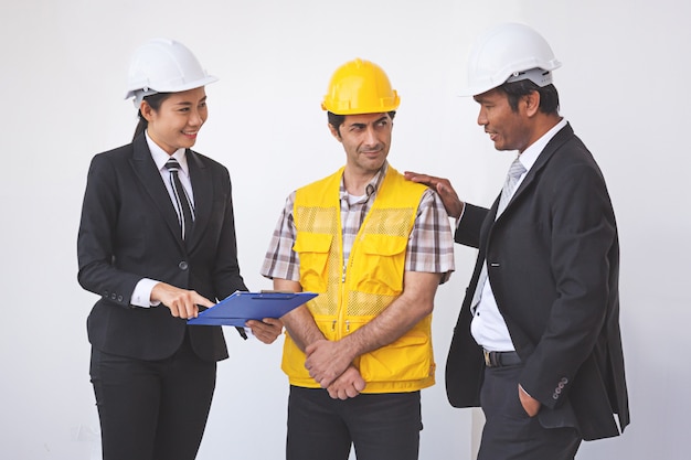 Construction manager and engineer talking