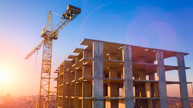 Construction of multi-storey brick house, drone view.