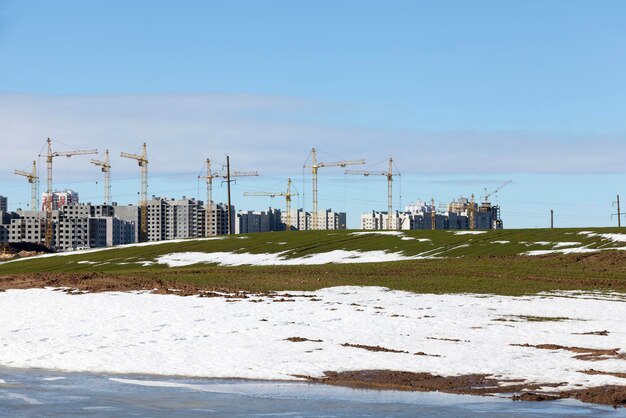 Construction of a new modern quarter in a city with a large number of multi-apartment high-rise buildings, modern building construction