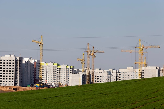 Construction of a new modern quarter in a city with a large number of multi-apartment high-rise buildings, modern building construction