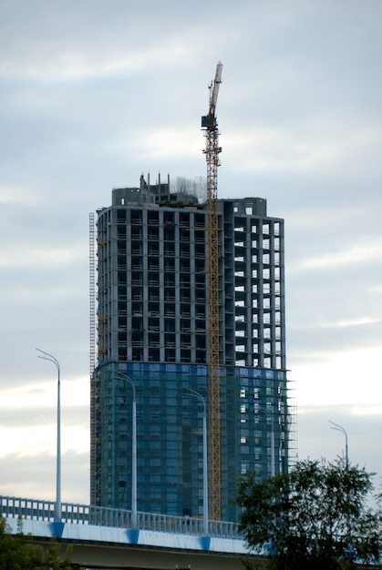 Construction of office building from glass and concrete.