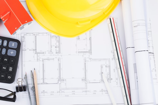 Construction planning with construction drawings and accessories,construction projects on paper 