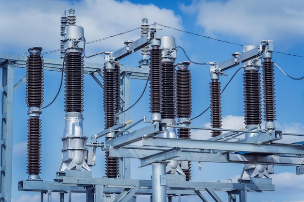 Construction of a power transmission substation on a background of blue sky