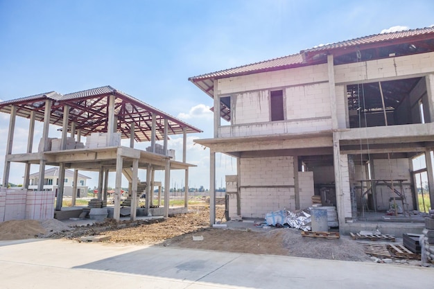 Construction residential new house in progress at building site housing estate development