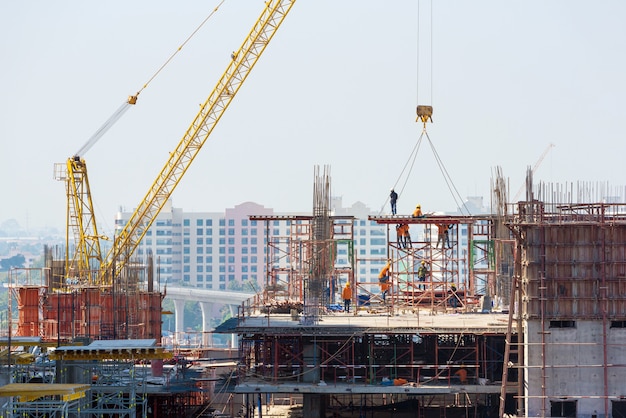 Construction site busy operate in beginning of building new complex infrastructure project.