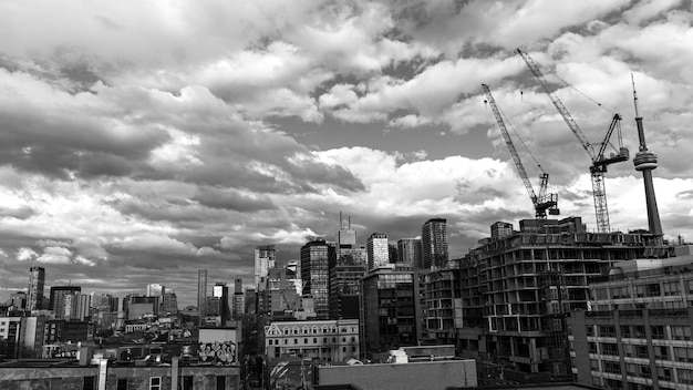 Photo construction site by buildings against sky