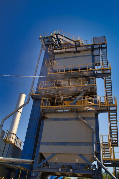 Construction site construction of a plant for the production of\
asphalt selective focus closeup