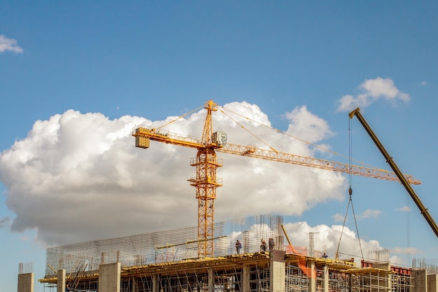 Construction site Tower crane An unfinished building