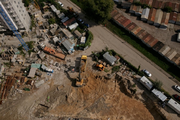 construction site with construction machinery top view