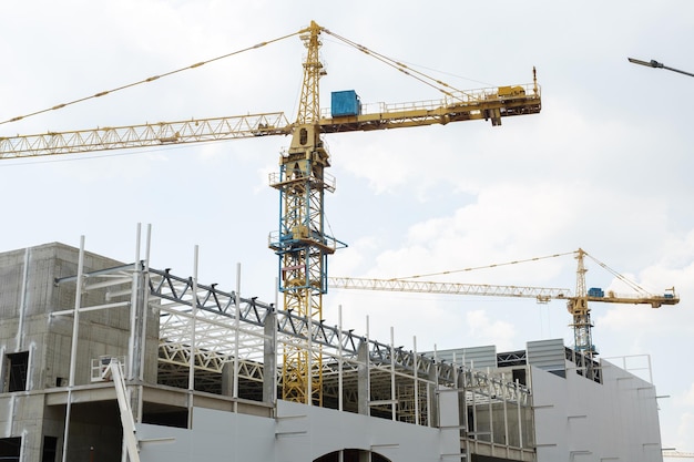 Construction site with crane and building Construction of a residential multistorey building