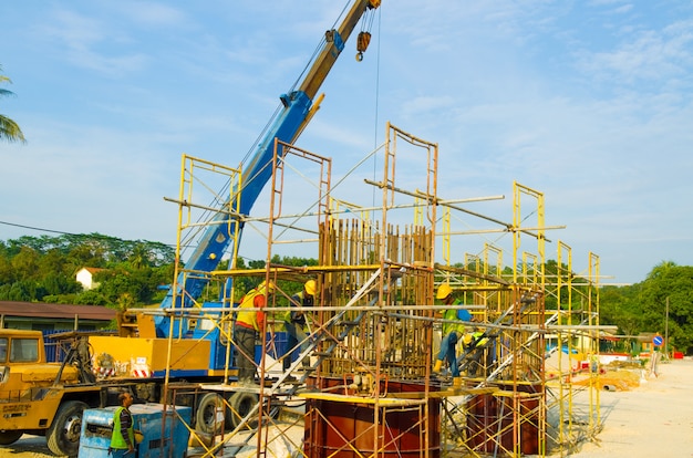 Construction site with crane and workers