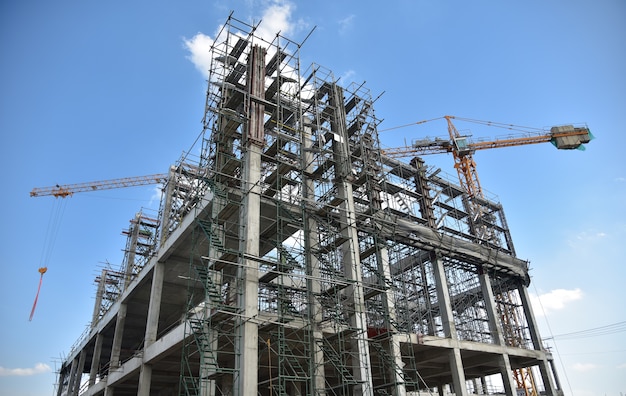 Construction Site with Cranes and construction worker 