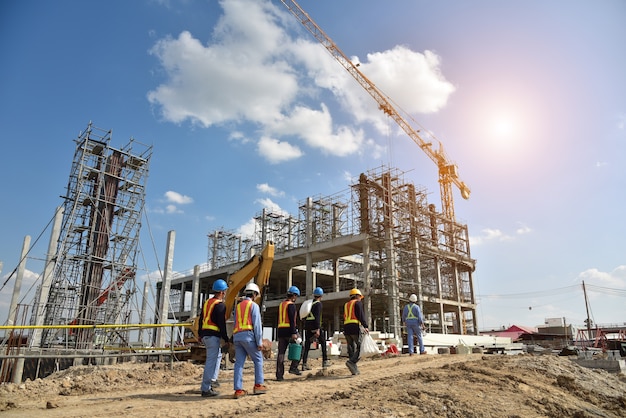 Construction Site with Cranes and construction worker 