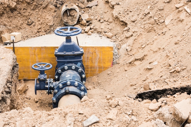construction site with water pipe valves